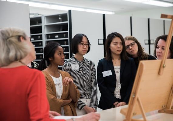 students looking at artwork